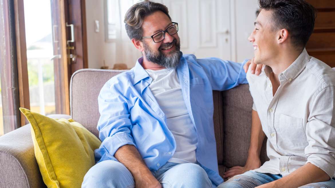 Father talking to his teenage son