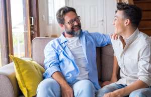 Father talking to his teenage son