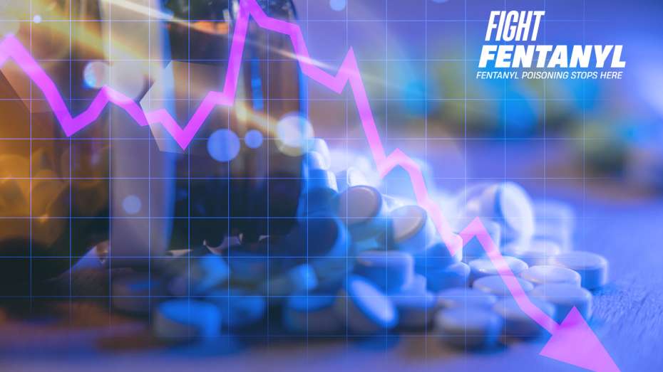 Bottle of pills spilled out with a declining line graph overlaid